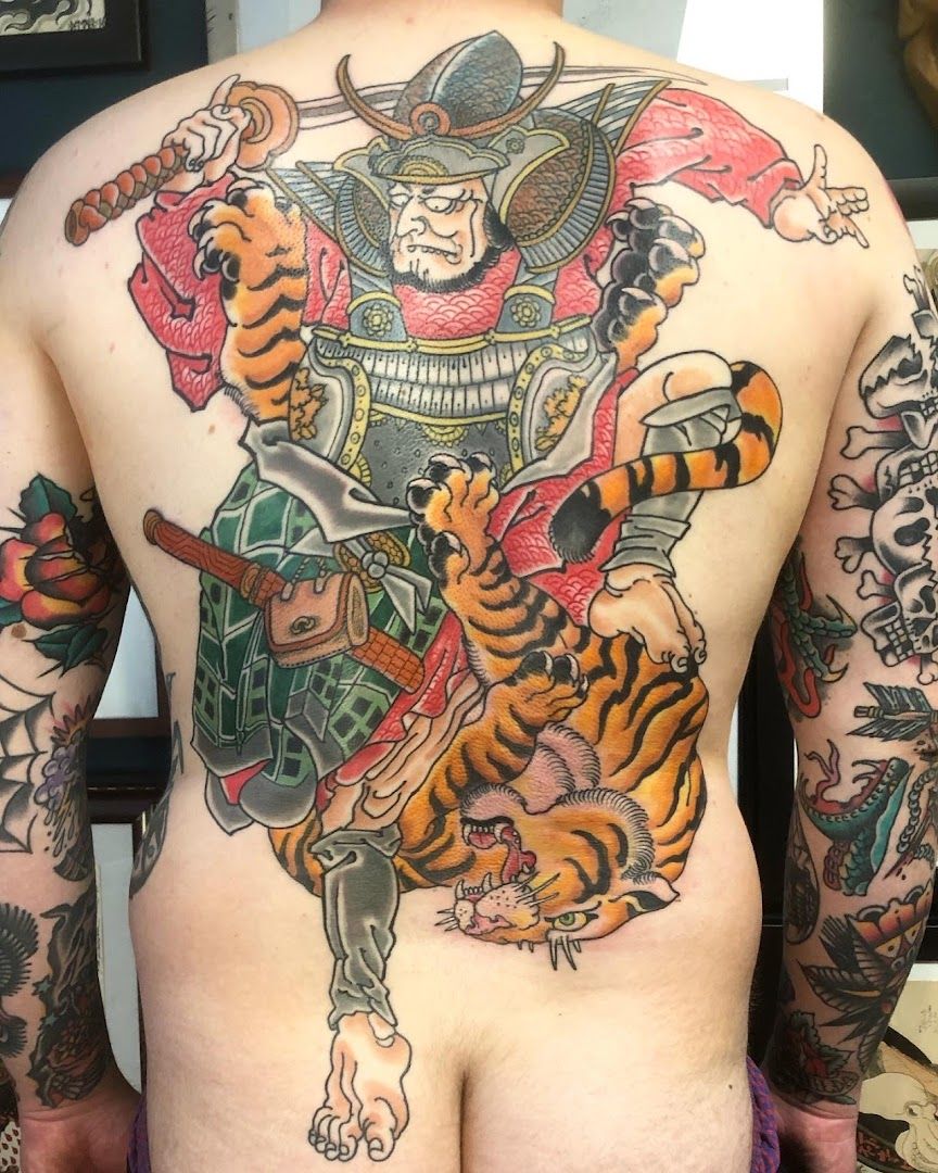 a man with a tiger japanische tattoos in leipzig on his back, forchheim, germany