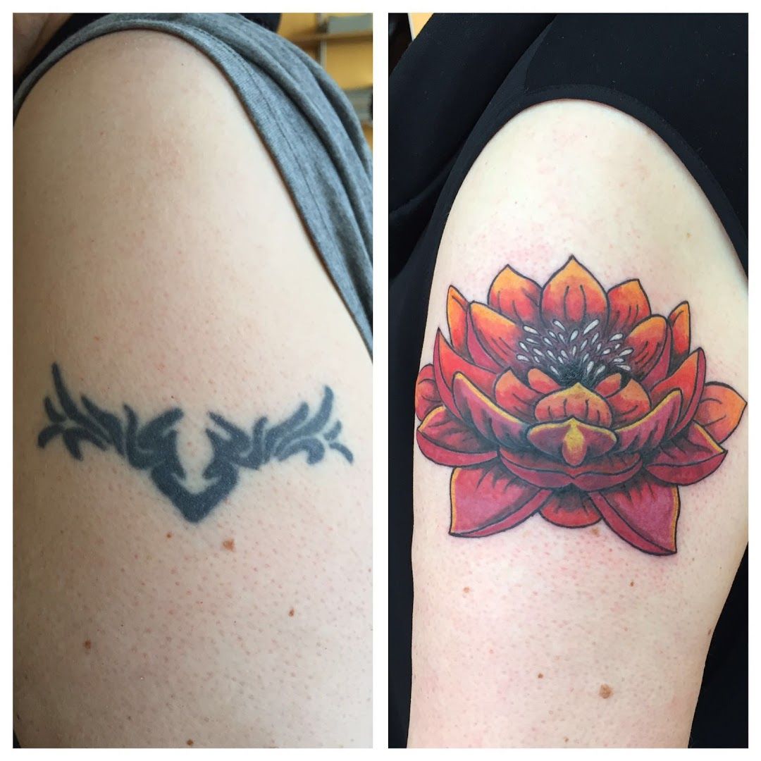 a narben tattoo with a flower on the left arm, bochum, germany