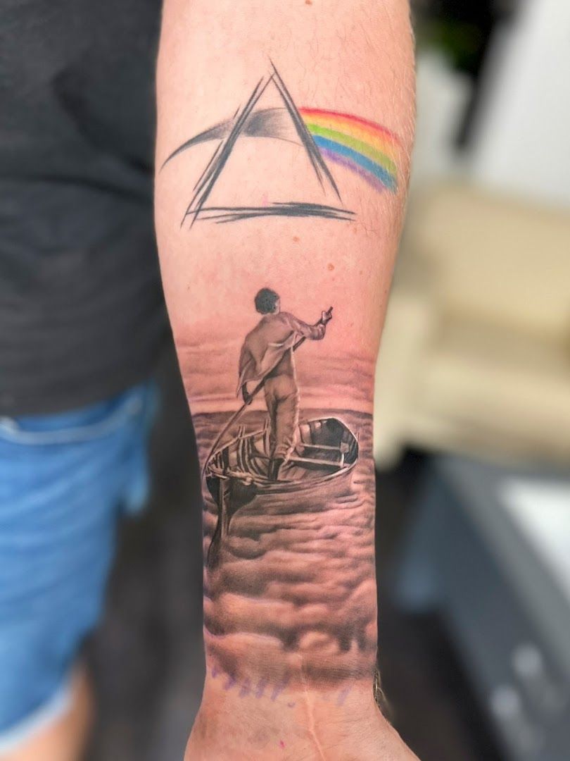 a man with a rainbow narben tattoo on his arm, südwestpfalz, germany