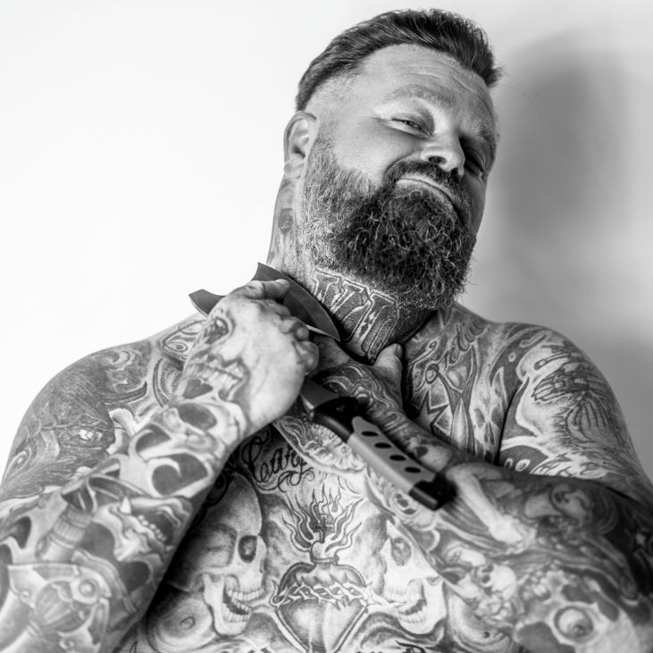 a man with narben tattoos on his chest, ansbach, germany