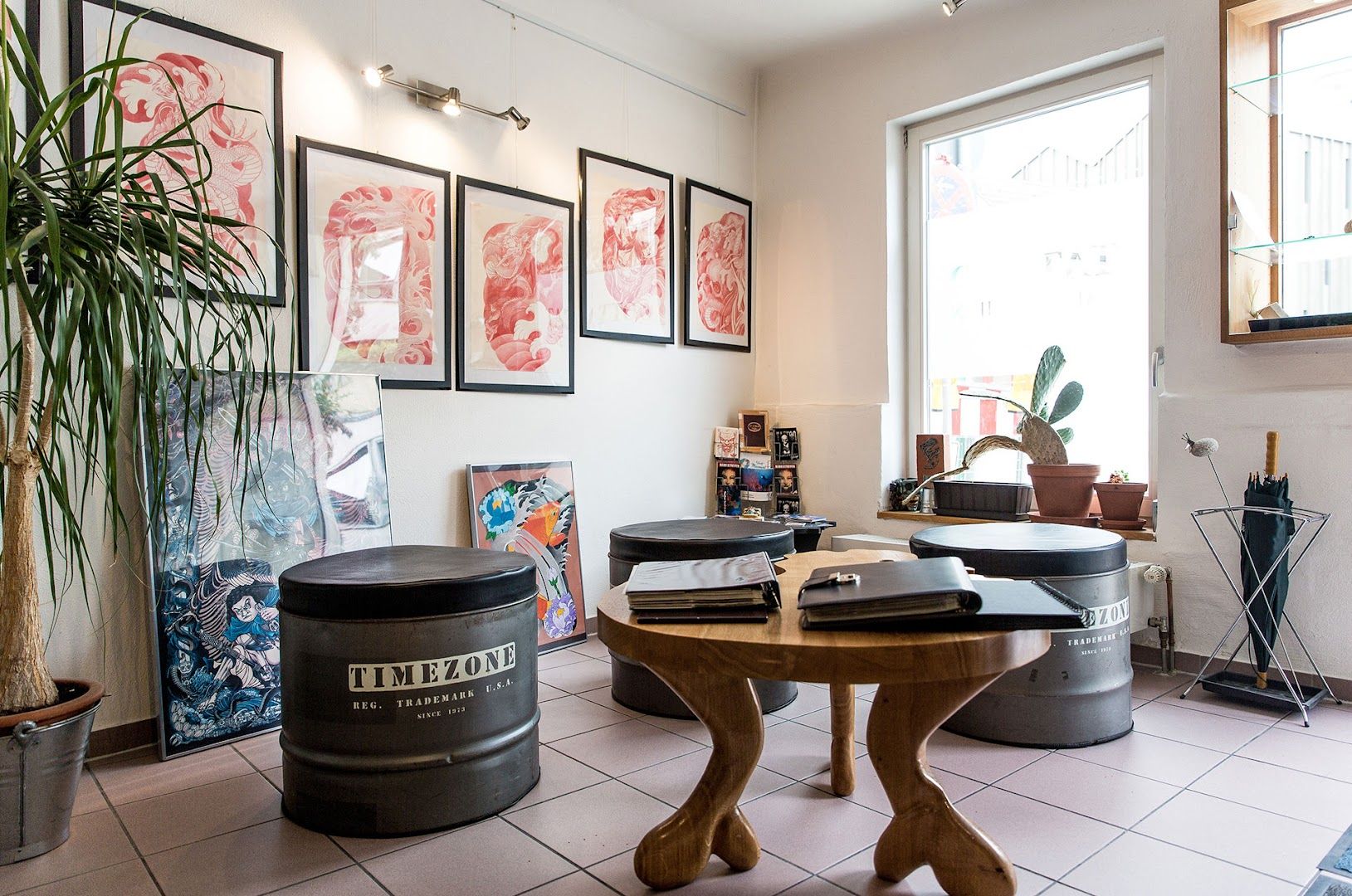 a room with a table and a plant