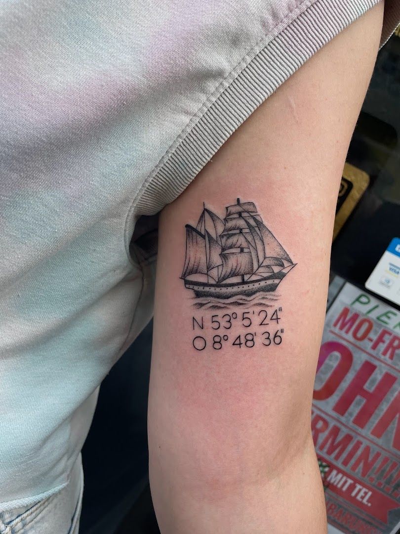 a black and white narben tattoo of a sail, cuxhaven, germany