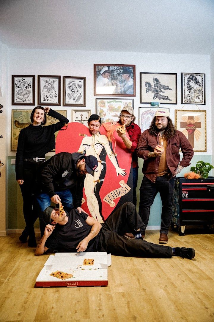 the band the strangles posing in their studio