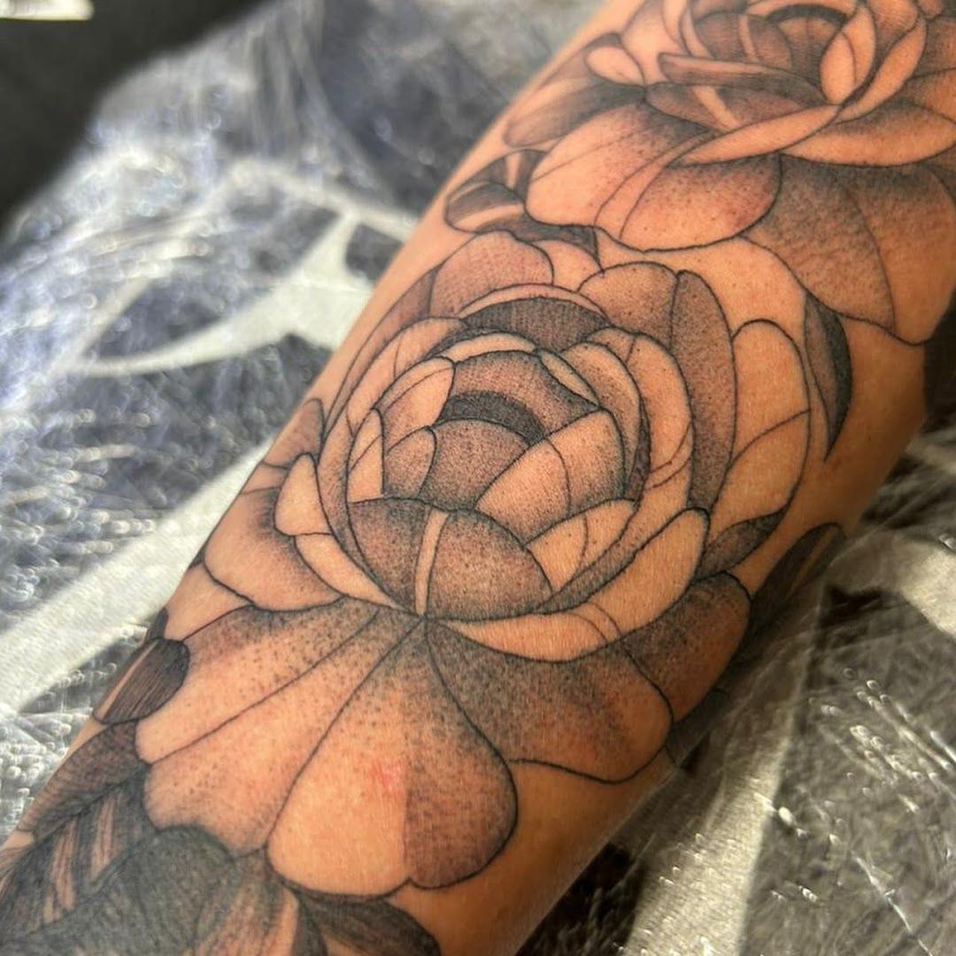 a rose blackwork tattoo on the forearm, nürnberg, germany