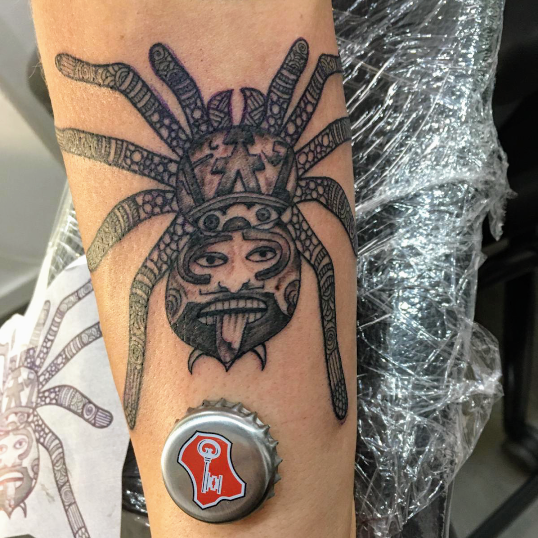 a narben tattoo with a spider on it, frankfurt, germany