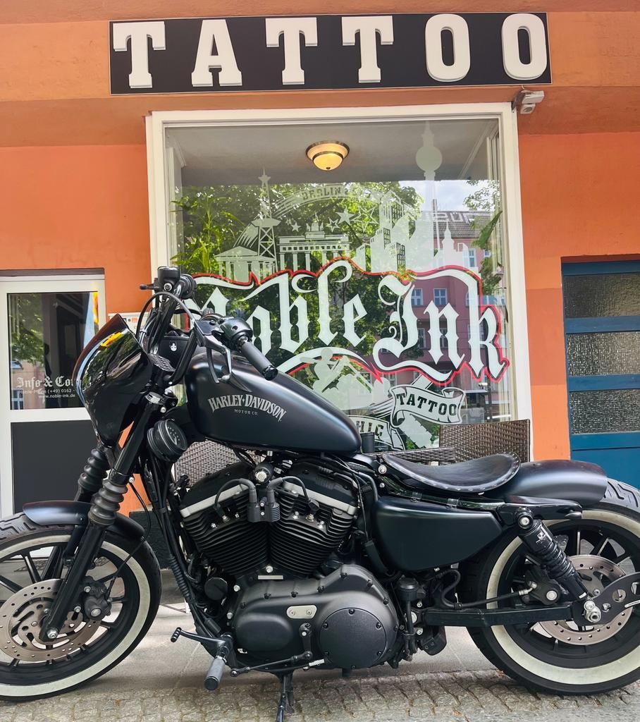 a motorcycle parked in front of a building