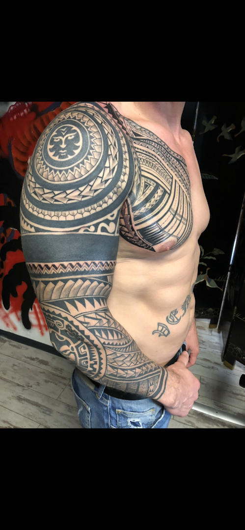 a man with a cover-up tattoo on his arm, neu-ulm, germany