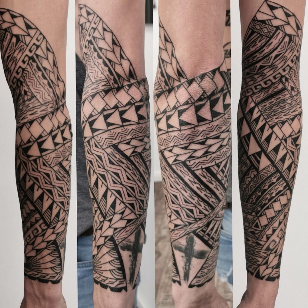 a man's arm with a black and white cover-up tattoo design, waldshut, germany