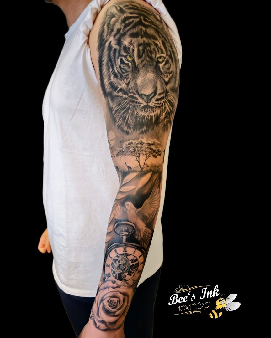 a man with a tiger japanische tattoos in leipzig on his arm, minden-lübbecke, germany