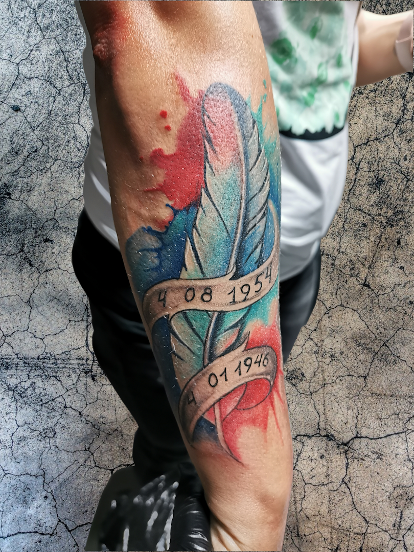 a man with a portrait tattoos on his arm, hamburg, germany