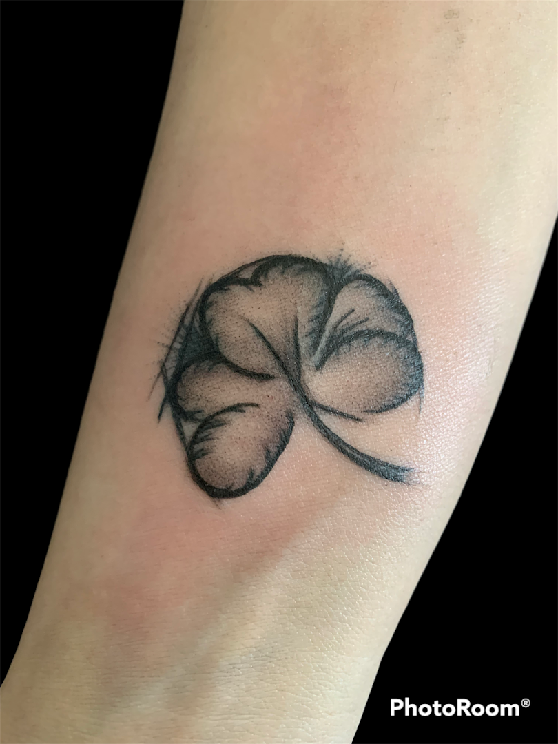 a cover-up tattoo of a flower on the wrist, mettmann, germany