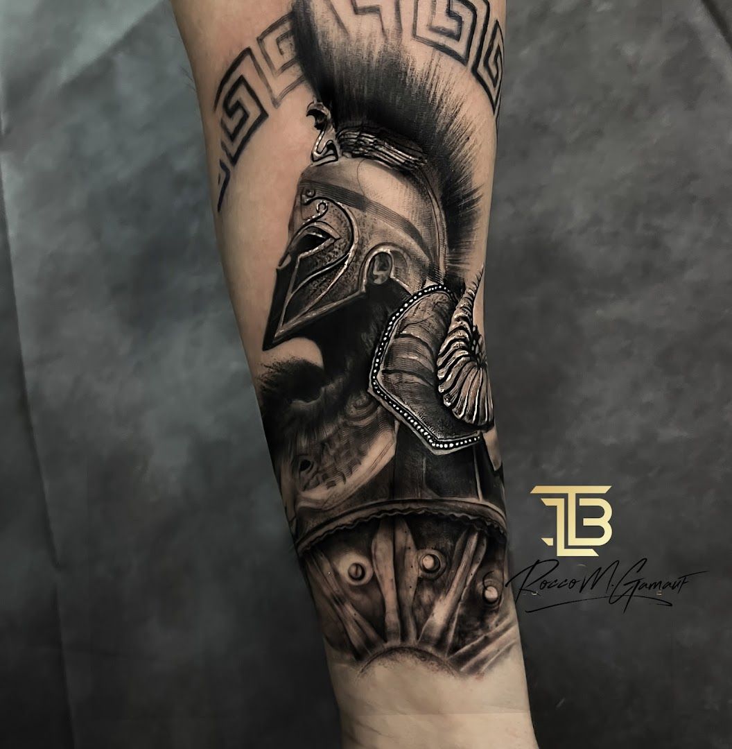 a black and white narben tattoo of a raven with a skull on his arm, minden-lübbecke, germany