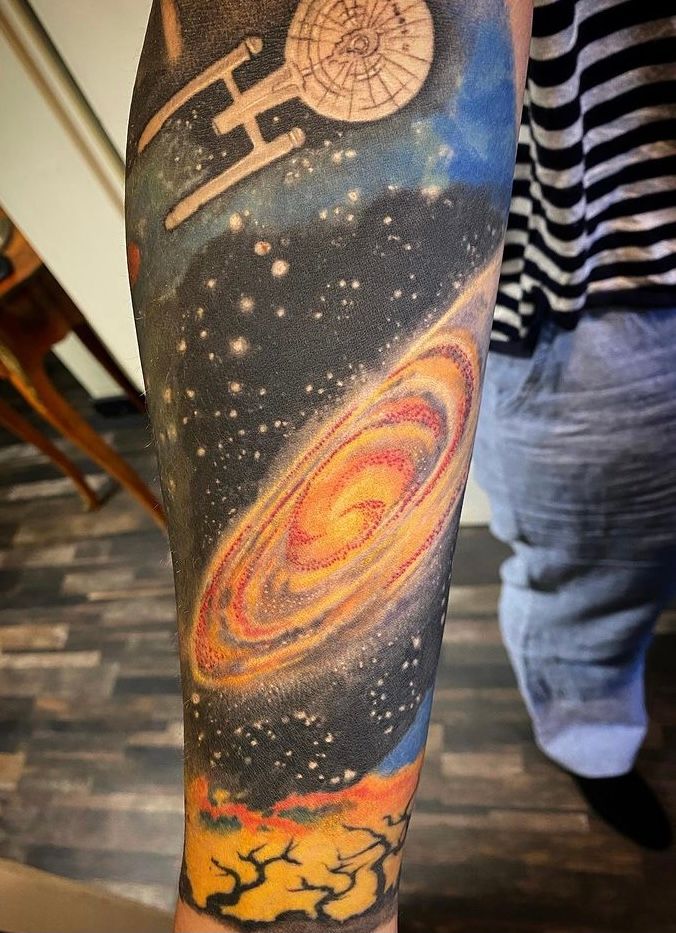 a man with a cover-up tattoo on his arm, kreisfreie stadt darmstadt, germany