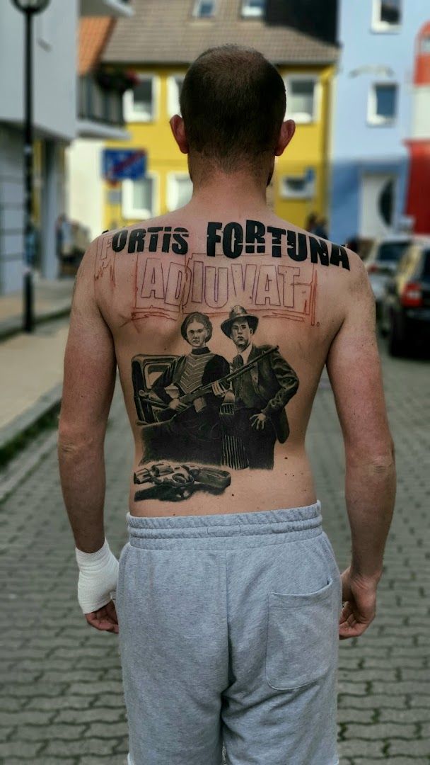 a man with a narben tattoo on his back, kreisfreie stadt rostock, germany