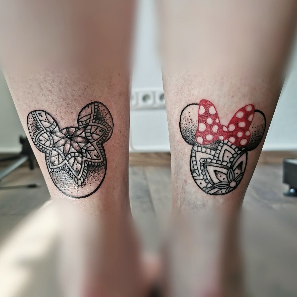 two minnie mouse trashpolka tattooss on both legs, bayreuth, germany