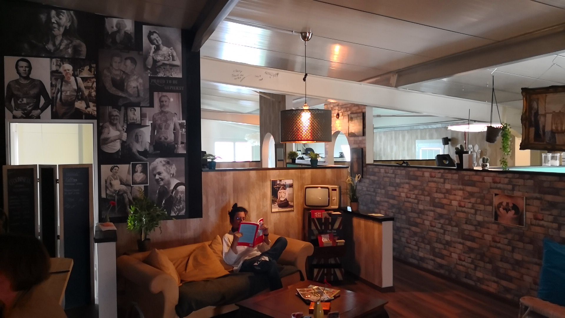 a woman sitting on a couch in a living room