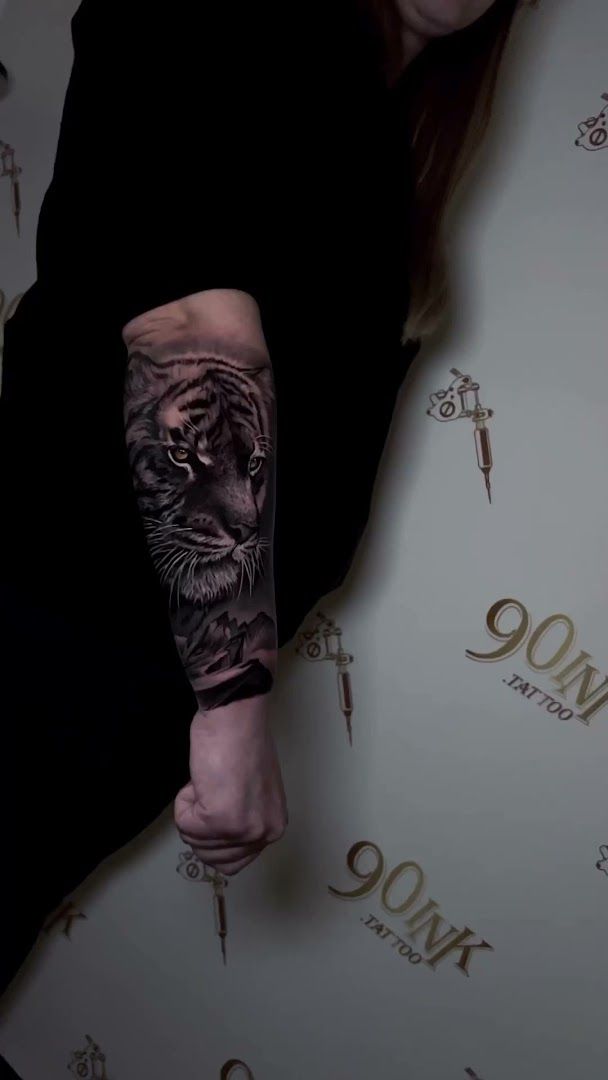 a tiger cover-up tattoo on the forearm, nürnberg, germany