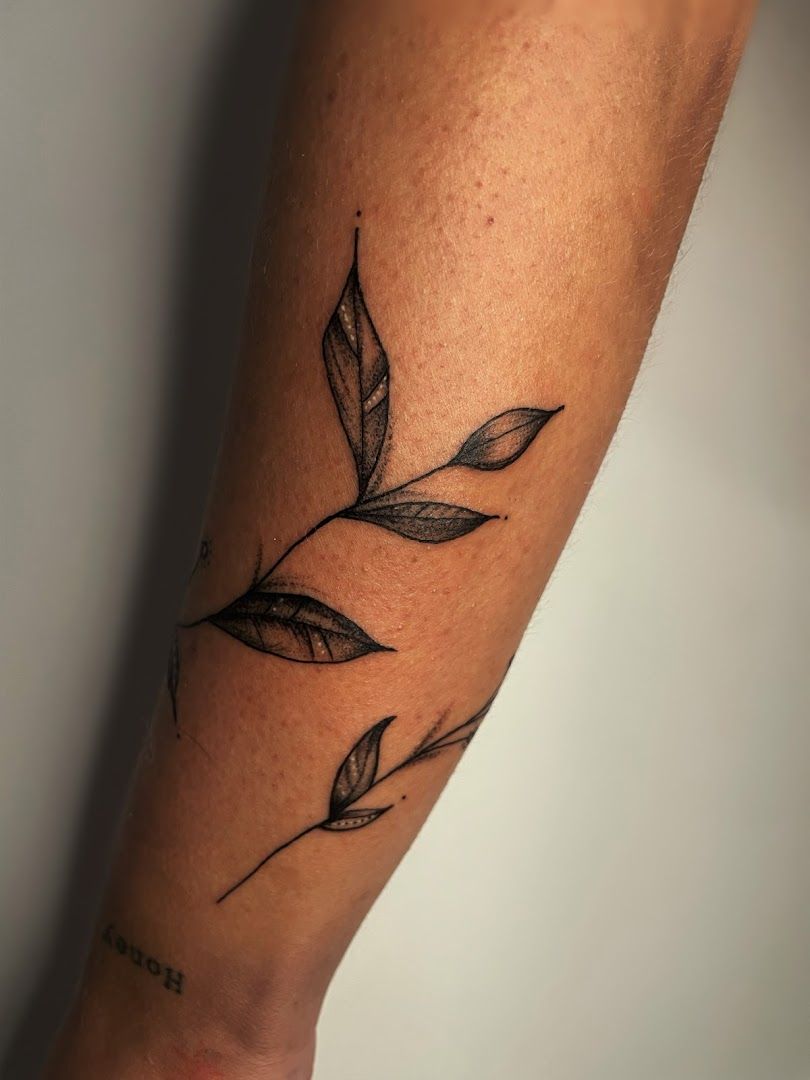 a black and white cover-up tattoo design on the forearm, delmenhorst, germany