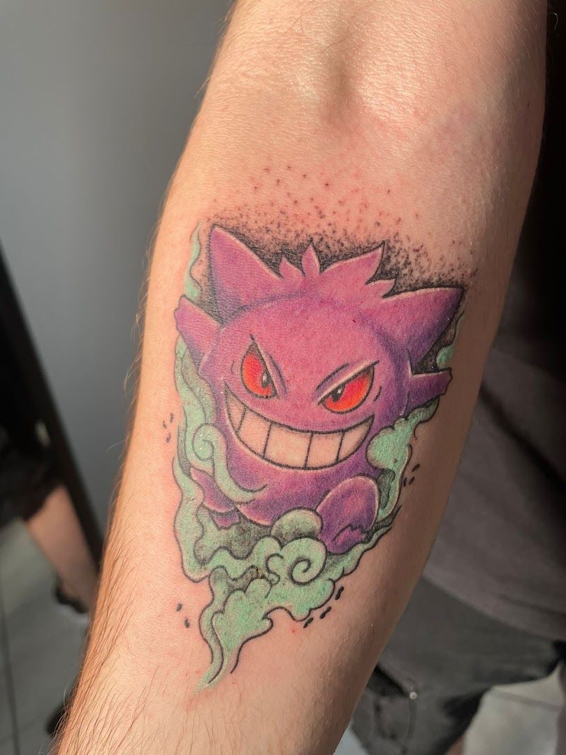 a narben tattoo of a pink and green pokemon tattoo, duisburg, germany