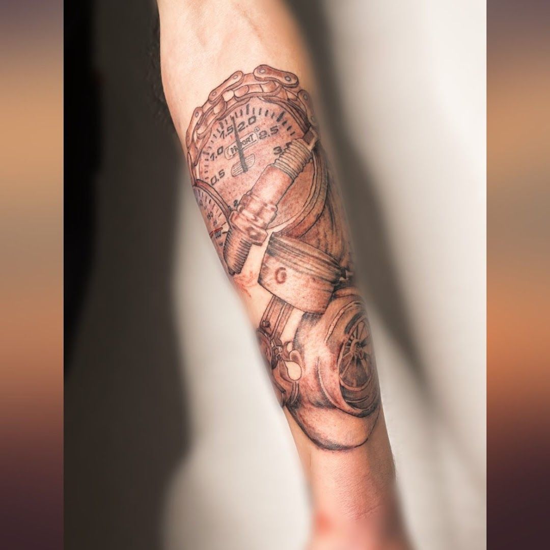 a narben tattoo with a clock and a clock on it, gotha, germany