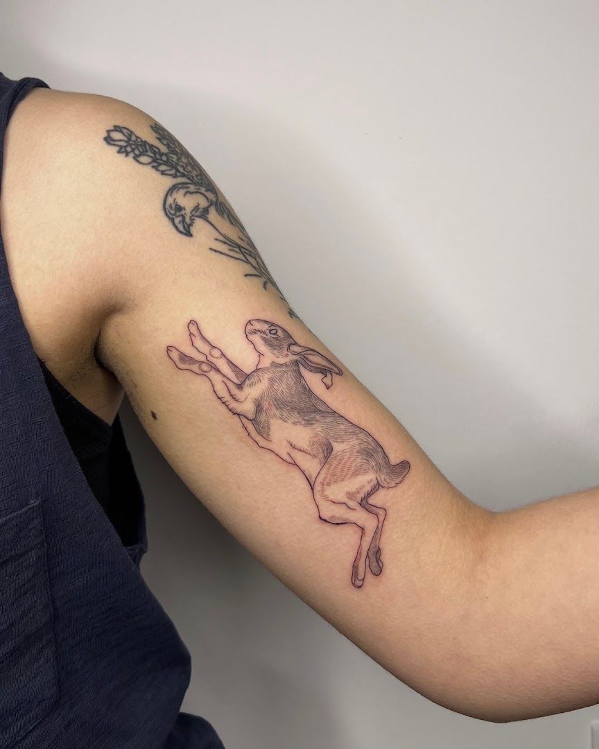 a japanische tattoos in leipzig of a rabbit on the arm, kreisfreie stadt münster, germany