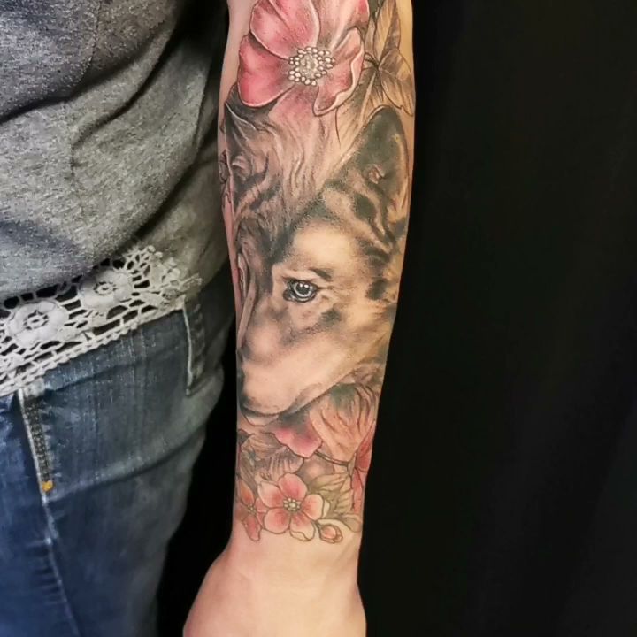 a woman with a cover-up tattoo on her arm, görlitz, germany