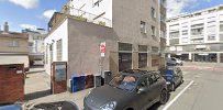 a car parked in front of a building