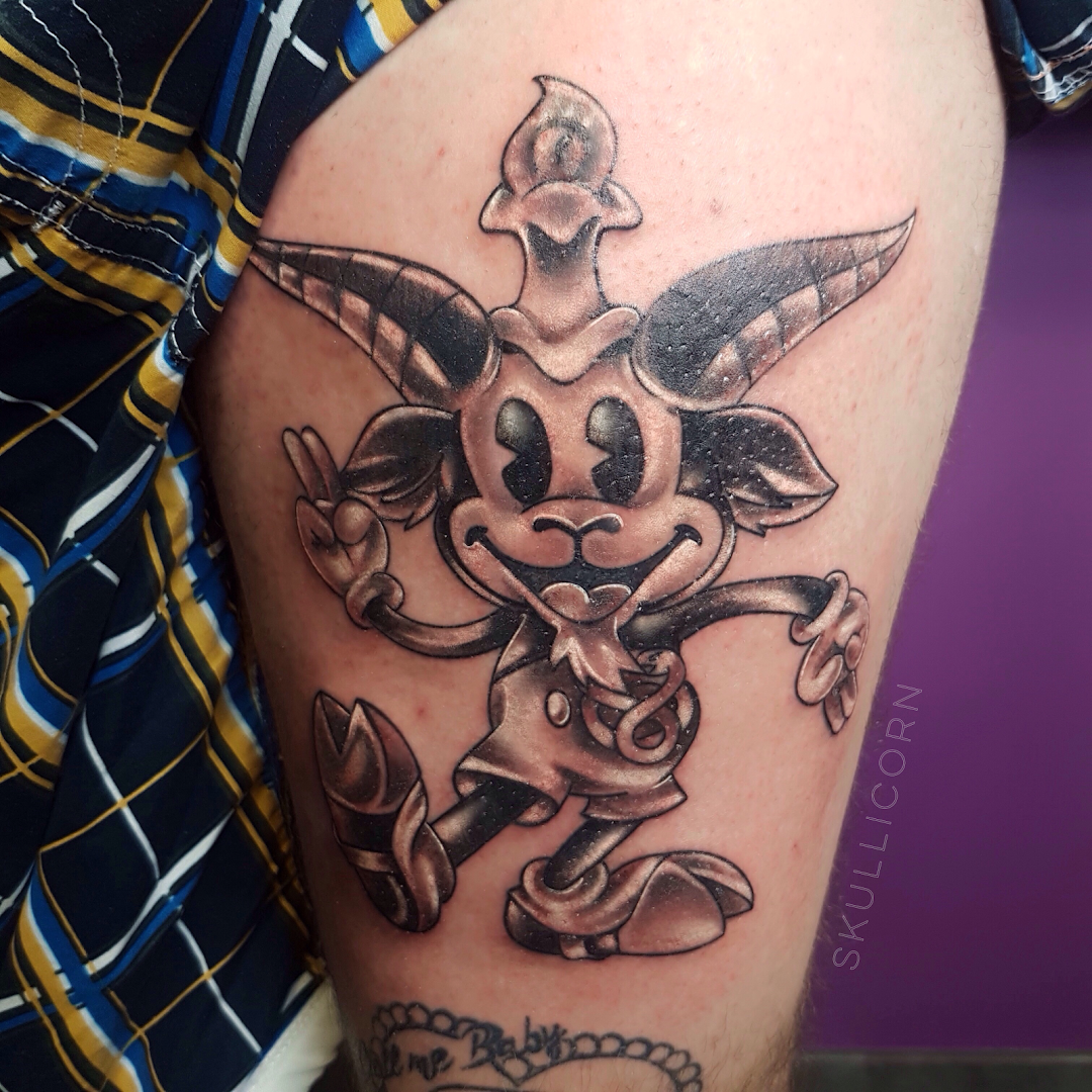 a narben tattoo of a mickey mouse on a man's leg, main-kinzig-kreis, germany