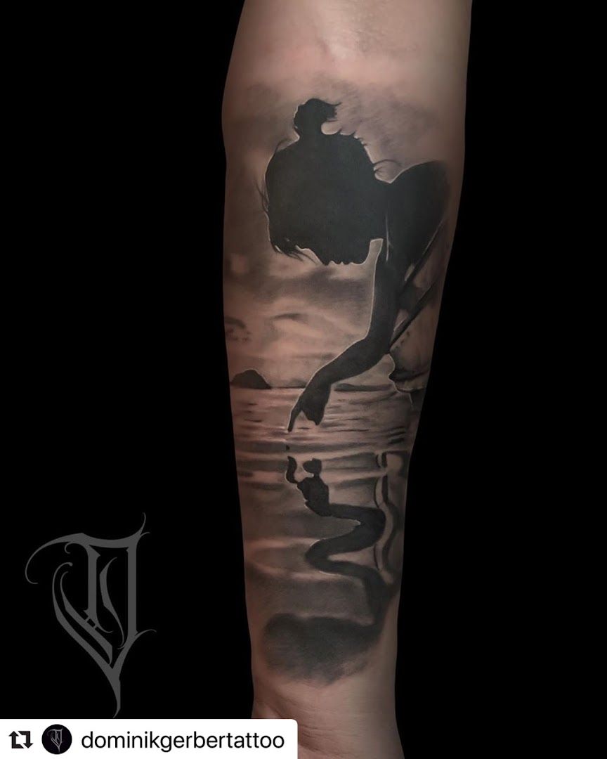 a black and grey cover-up tattoo of a dolphin, minden-lübbecke, germany