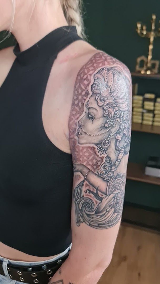 a woman with a japanische tattoos in leipzig on her arm, soest, germany