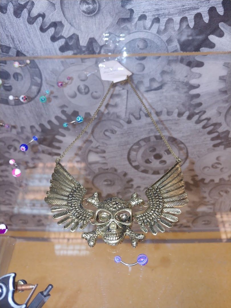 a necklace with an owl on it