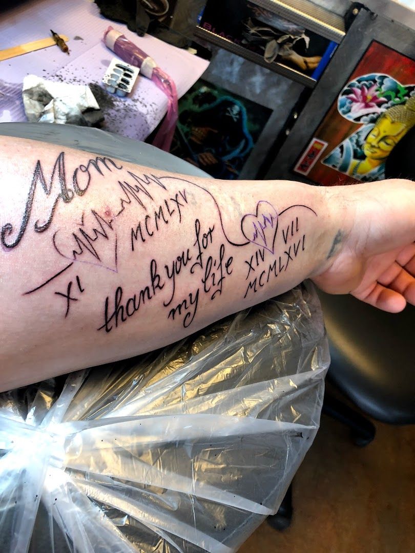 a cover-up tattoo with the words i am, am, am, am, am, am, am, bielefeld, germany