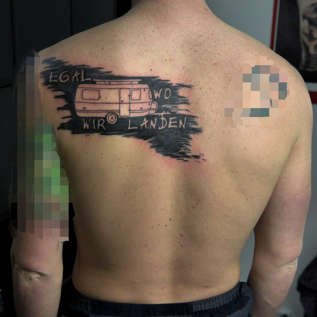 a man with a narben tattoo on his back, ravensburg, germany