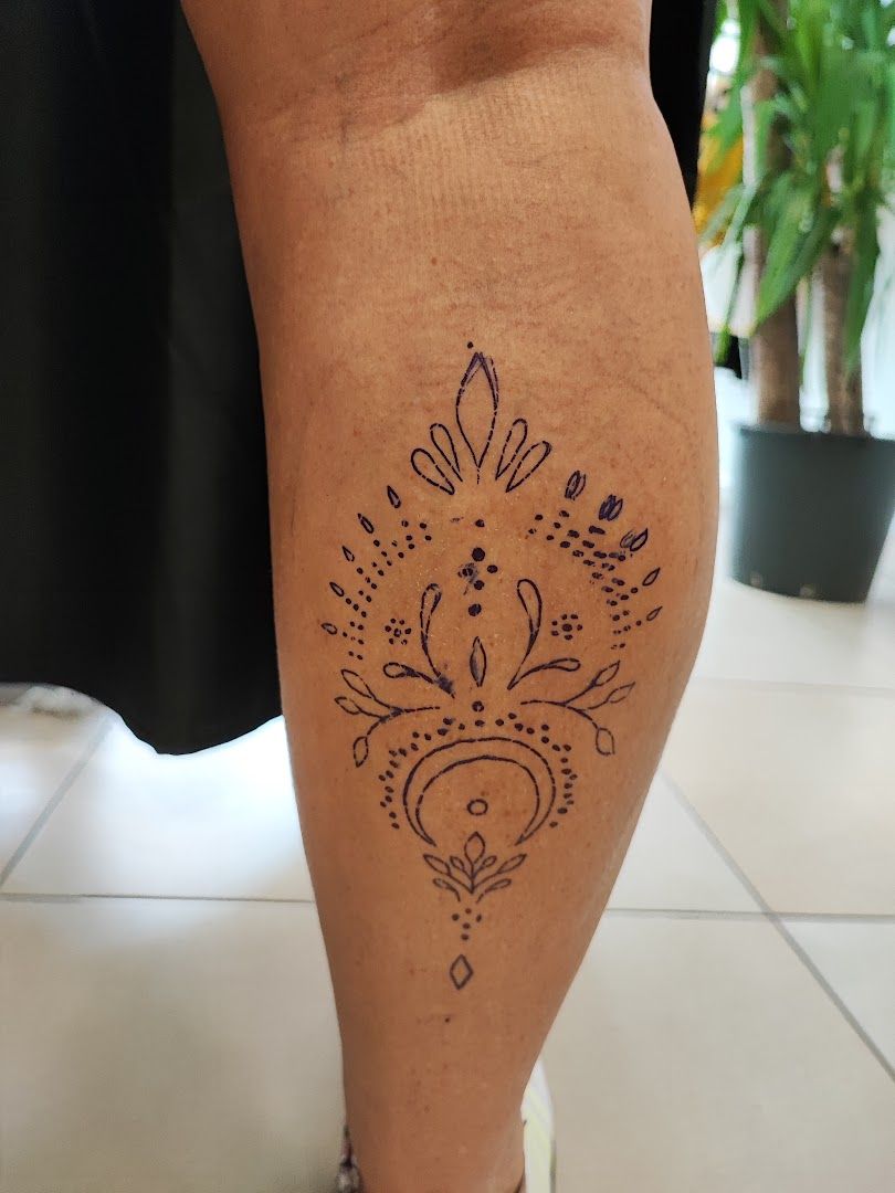 a woman's legs with a narben tattoo on it, essen, germany