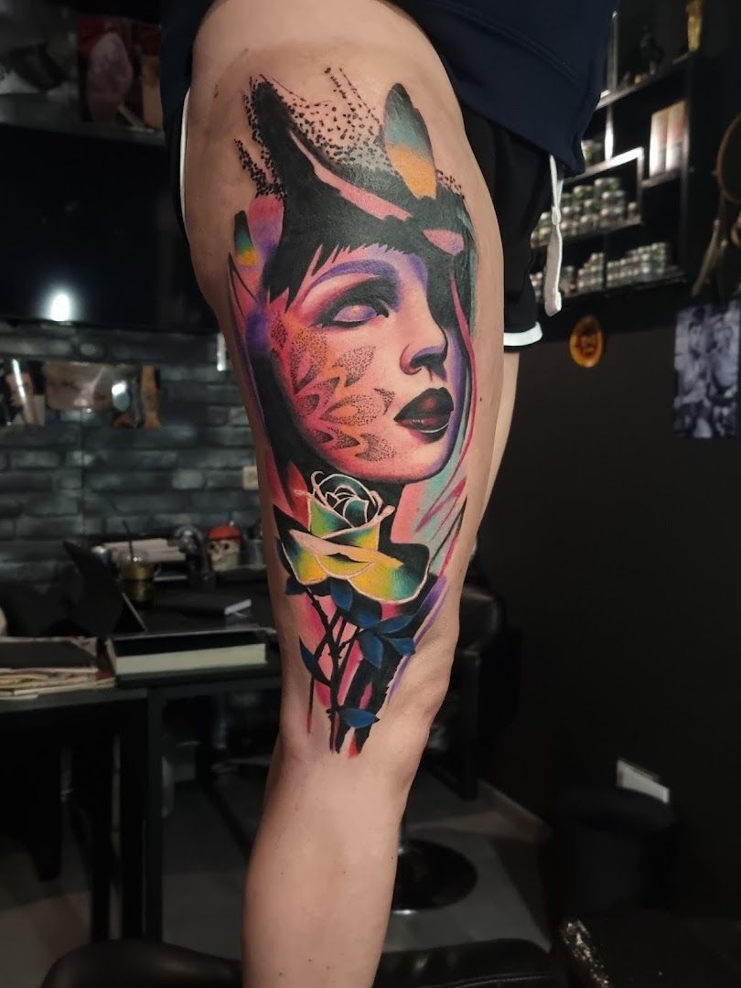 a narben tattoo of a woman with a colorful face, weißenburg-gunzenhausen, germany