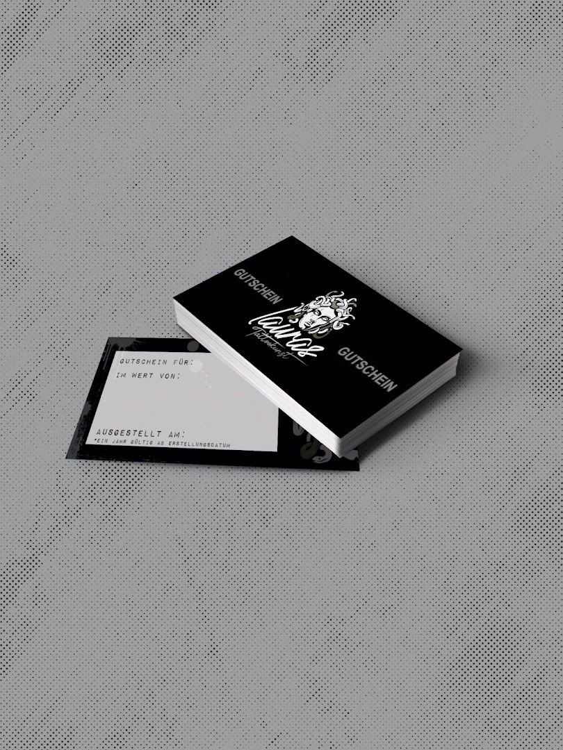 a business card with a lion logo on it