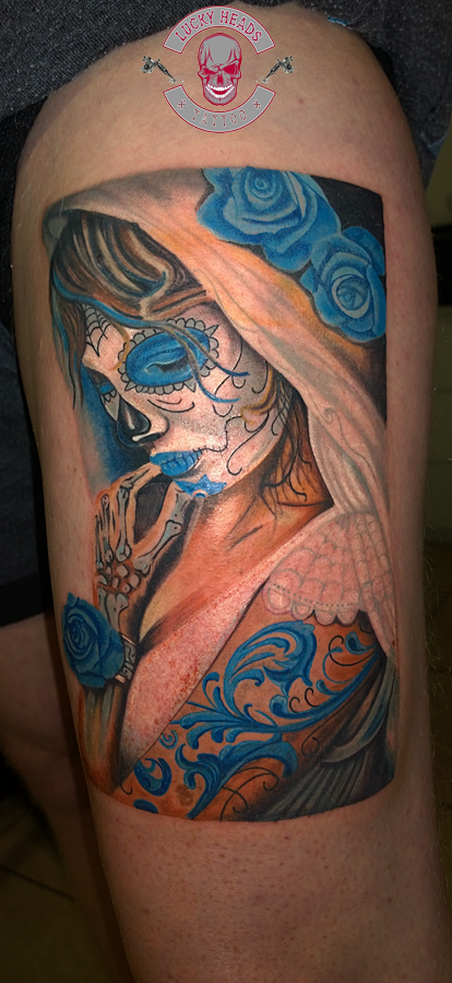 a woman with a cover-up tattoo on her arm, steinburg, germany