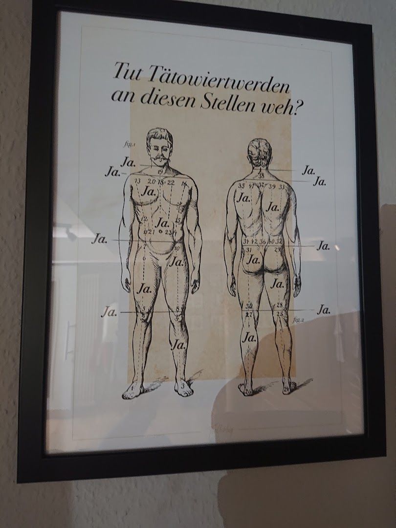 a framed picture of two men in underwear