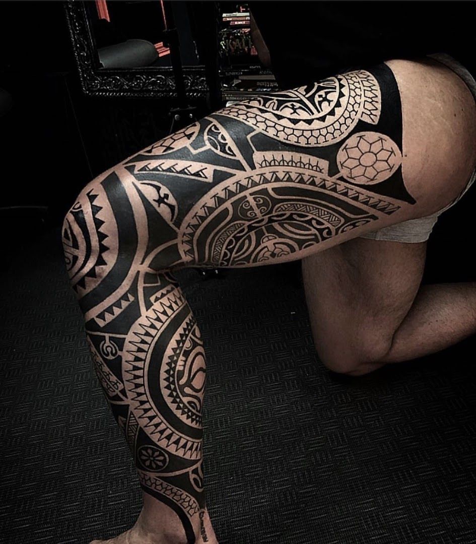 a man with a cover-up tattoo on his leg, kreisfreie stadt augsburg, germany