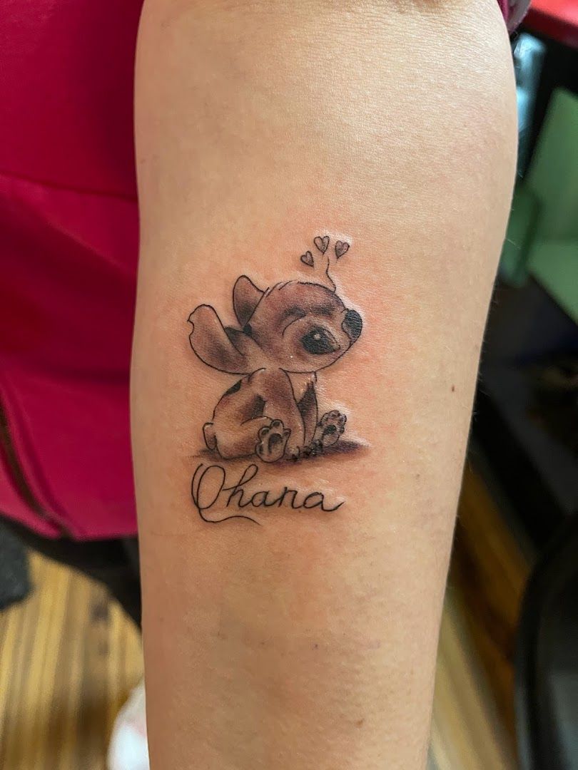 a narben tattoo of a cat with the word cat on it, oberbergischer, germany