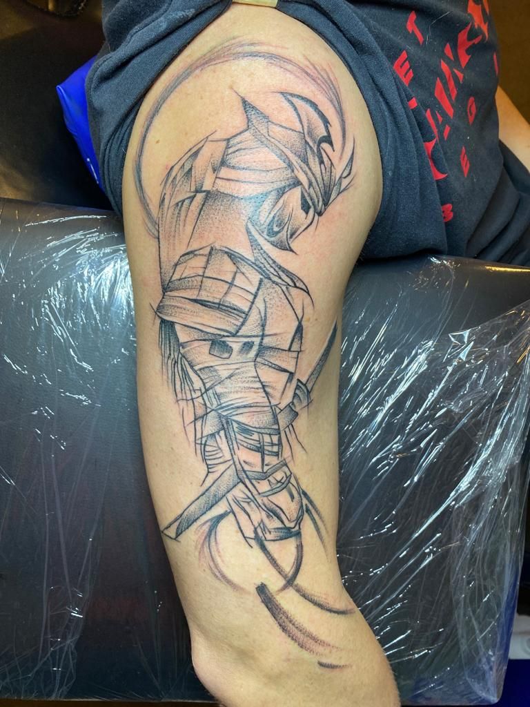 a narben tattoo of a man with a sword, osterholz, germany