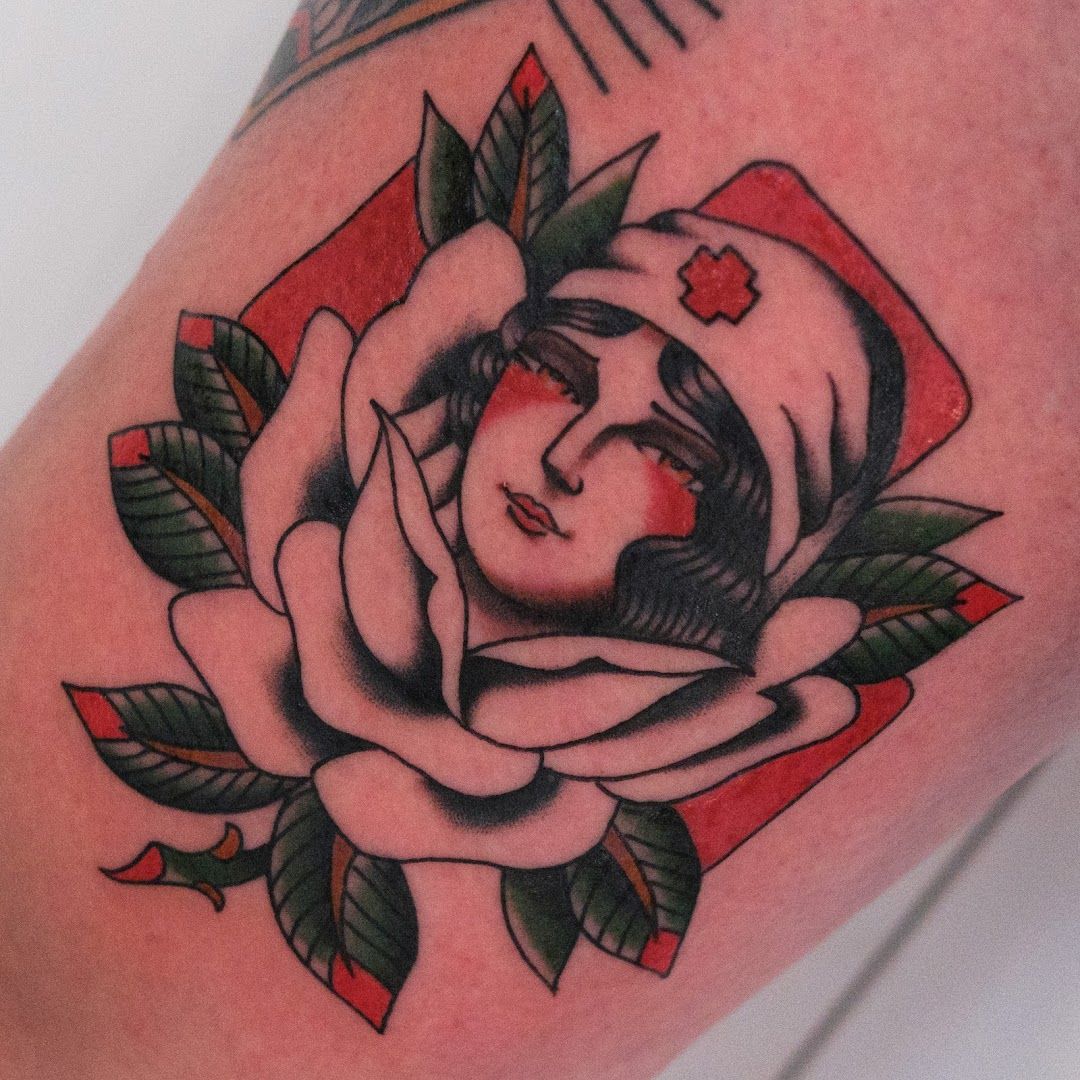 a rose cover-up tattoo on the arm, berlin, germany