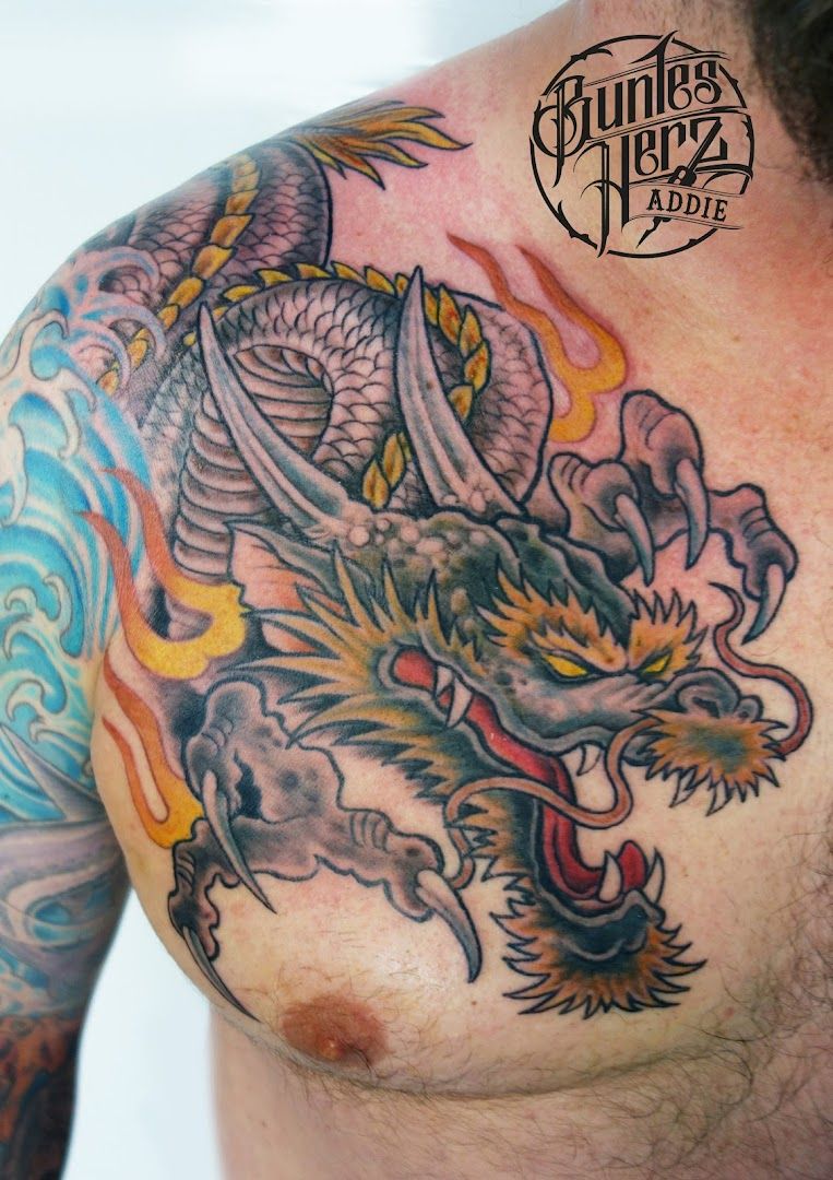 a man with a dragon narben tattoo on his chest, hamburg, germany