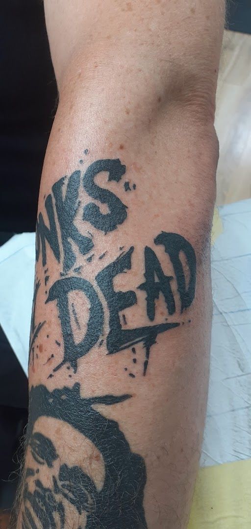 a man with a narben tattoo on his arm, rheinisch-bergischer kreis, germany