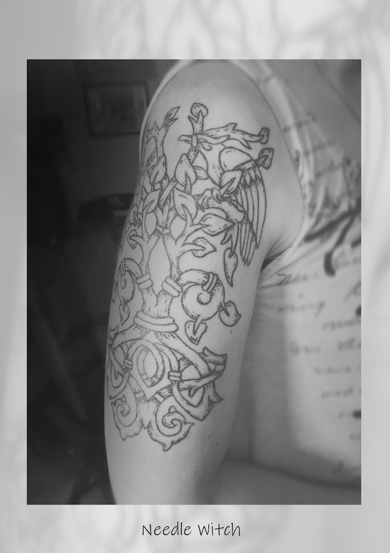 a narben tattoo with a dragon on the arm, unstrut-hainich-kreis, germany