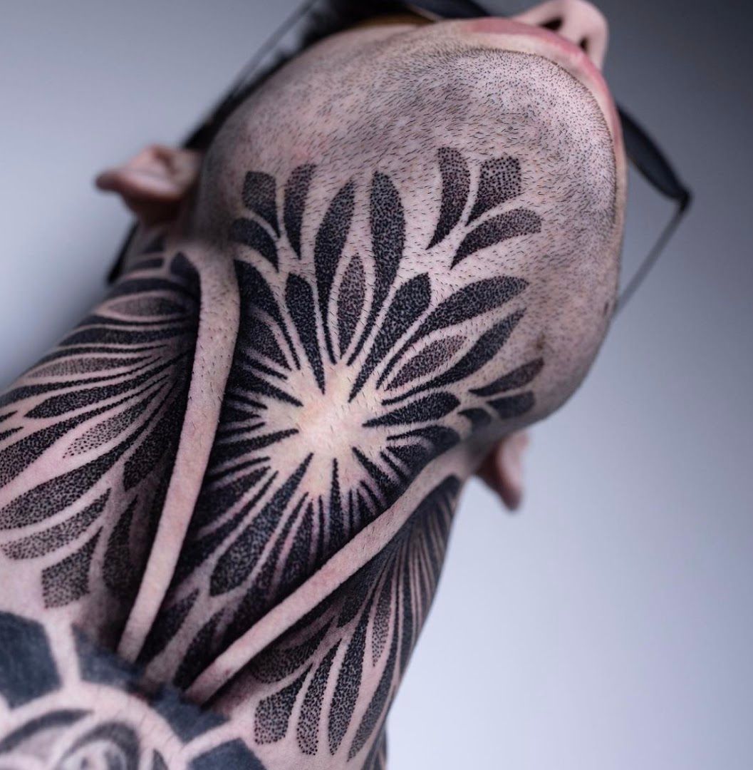 a man with a cover-up tattoo on his arm, bergstraße, germany