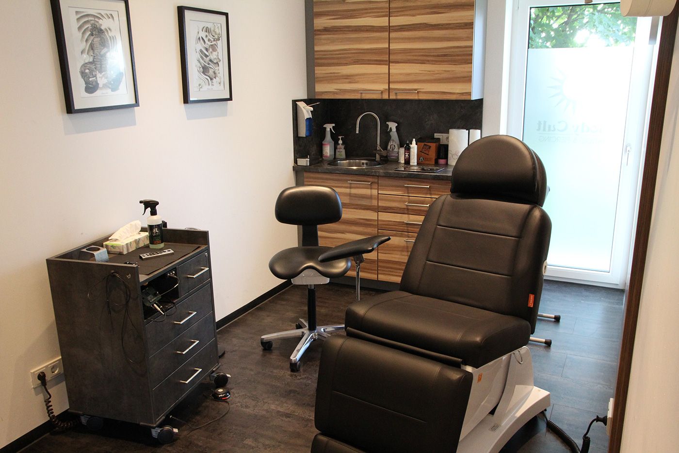 a salon chair with a hair dryer in the corner