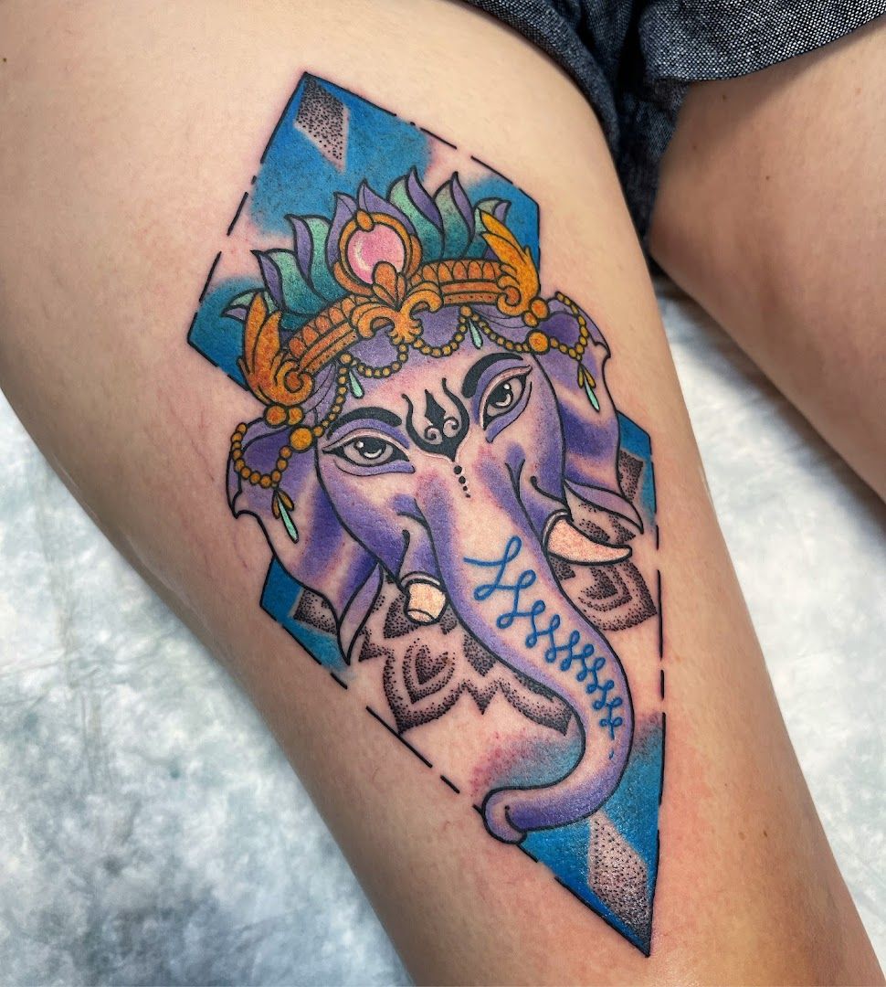 a cover-up tattoo of an elephant with a crown on its head, bochum, germany