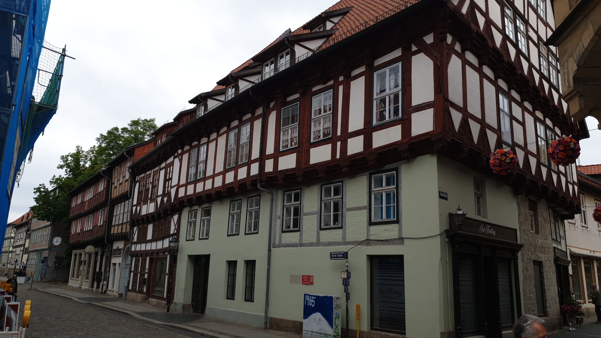 a building with a red and white roof