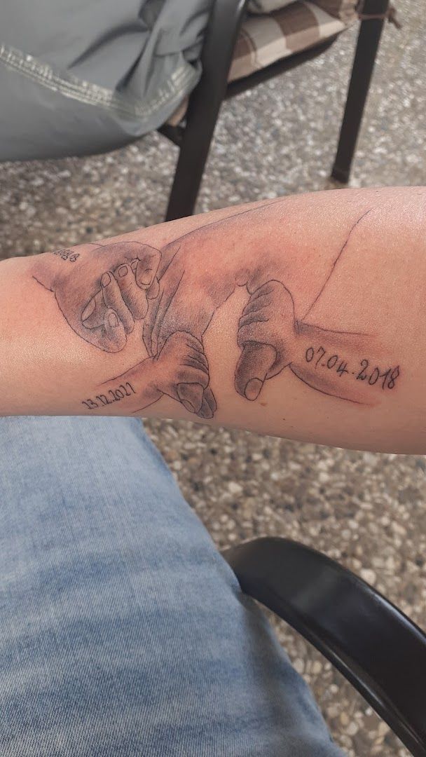 a narben tattoo of a hand with the words ` ` `'and ` ` ` ', stormarn, germany